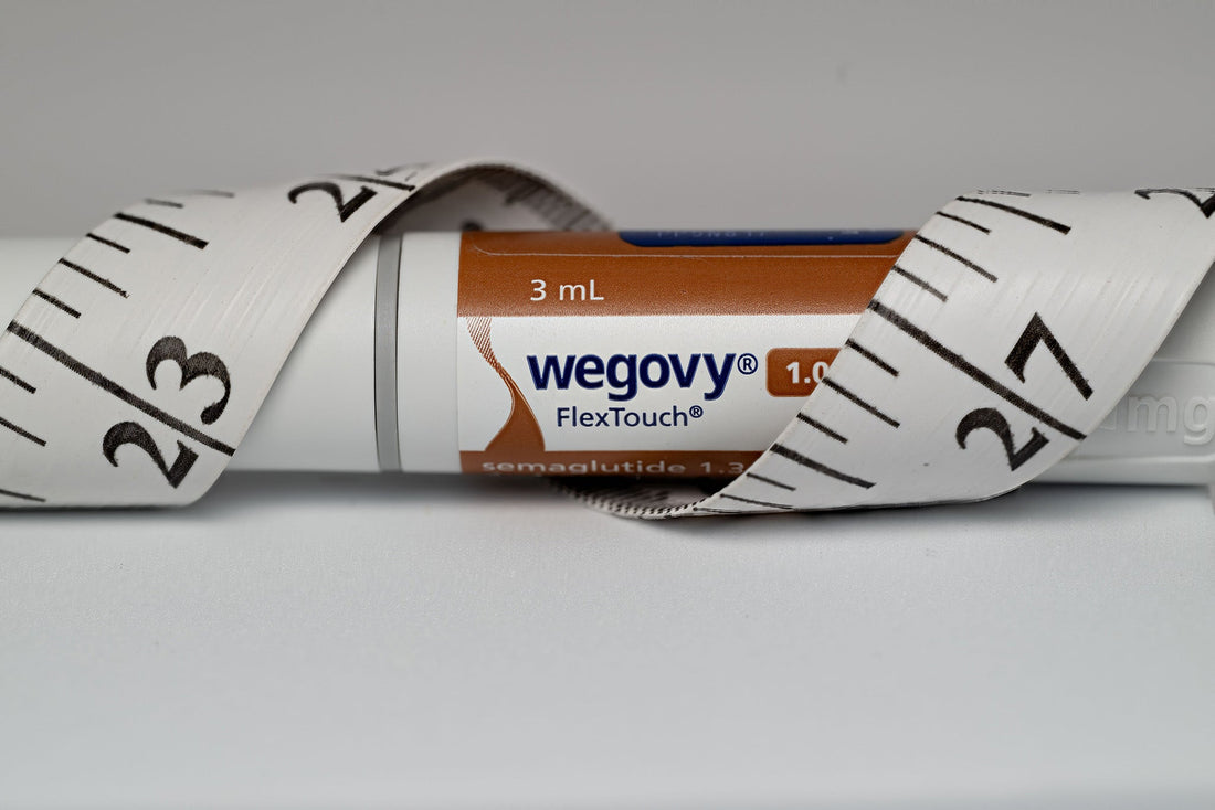 Wegovy FlexTouch injection pen wrapped in a white measuring tape