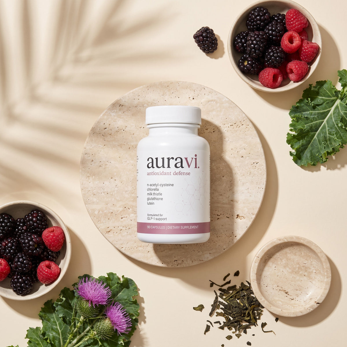 Antioxidant Defense flat-lay with fresh ingredients on travertine